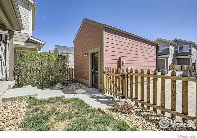 61 Avocet Ct, Longmont, CO 80501 - exterior space featuring fence and a gate