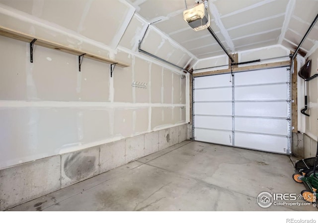 61 Avocet Ct, Longmont, CO 80501 - garage with a garage door opener