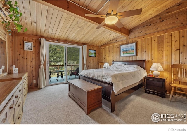 712 Aspen Dr, Lyons, CO 80540 - bedroom with access to outside, wooden walls, wood ceiling, light colored carpet, and vaulted ceiling with beams