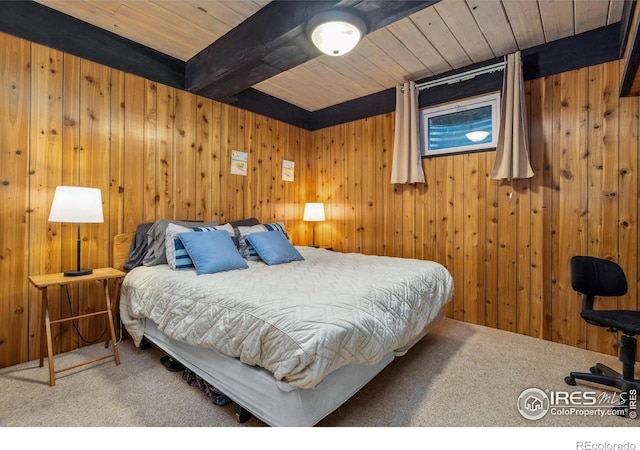 712 Aspen Dr, Lyons, CO 80540 - carpeted bedroom with wood ceiling, beamed ceiling, and wooden walls