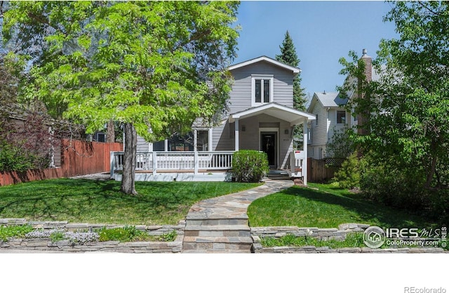 1835 Columbine Ave, Boulder, CO 80302 - view of front of property featuring covered porch, fence, and a front yard