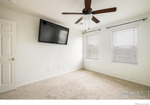 9283 Sedalia St, Commerce City, CO 80022 - empty room with carpet floors, baseboards, a ceiling fan, and visible vents