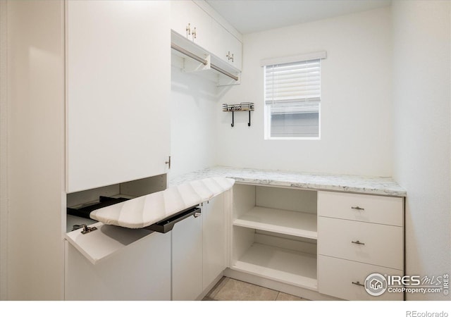 9283 Sedalia St, Commerce City, CO 80022 - unfurnished office featuring light tile patterned floors