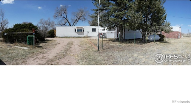 317 N Ord St, Grover, CO 80729 - view of front of home featuring fence and dirt driveway
