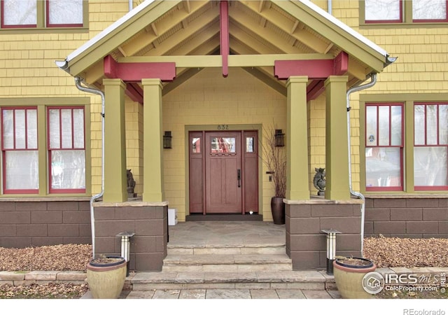 entrance to property with a porch