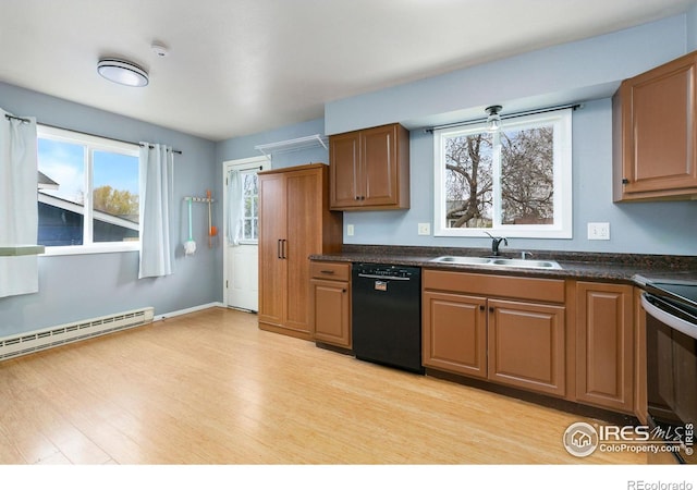 8205 Hallett Ct, Fort Collins, CO 80528 - kitchen featuring dishwasher, a sink, dark countertops, range with electric stovetop, and a baseboard radiator