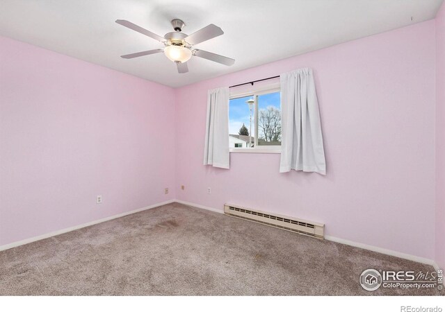8205 Hallett Ct, Fort Collins, CO 80528 - carpeted spare room with ceiling fan, a baseboard heating unit, and baseboards