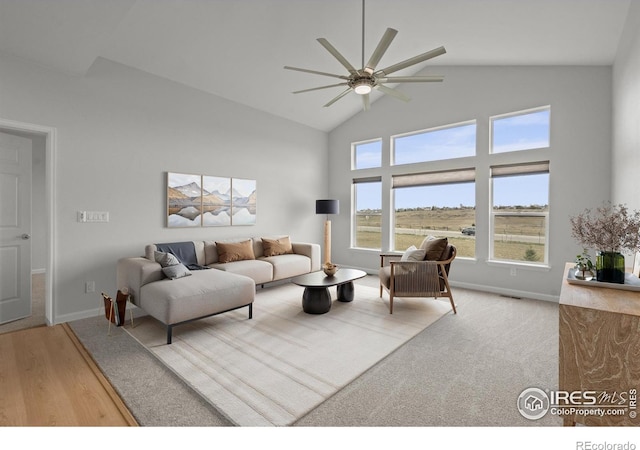 1103 Hornet Dr, Fort Collins, CO 80526 - living area featuring high vaulted ceiling, baseboards, and ceiling fan