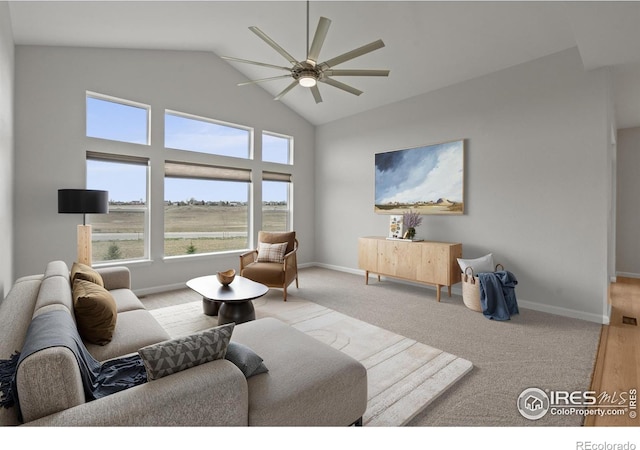 1103 Hornet Dr, Fort Collins, CO 80526 - living room featuring baseboards, a ceiling fan, and high vaulted ceiling