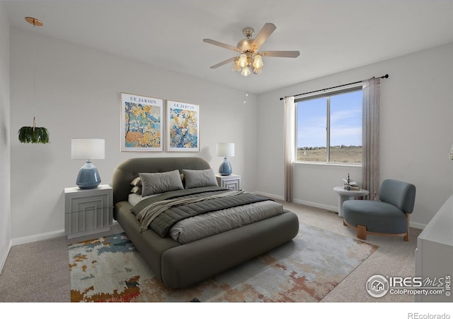 1103 Hornet Dr, Fort Collins, CO 80526 - bedroom with baseboards, a ceiling fan, and carpet floors