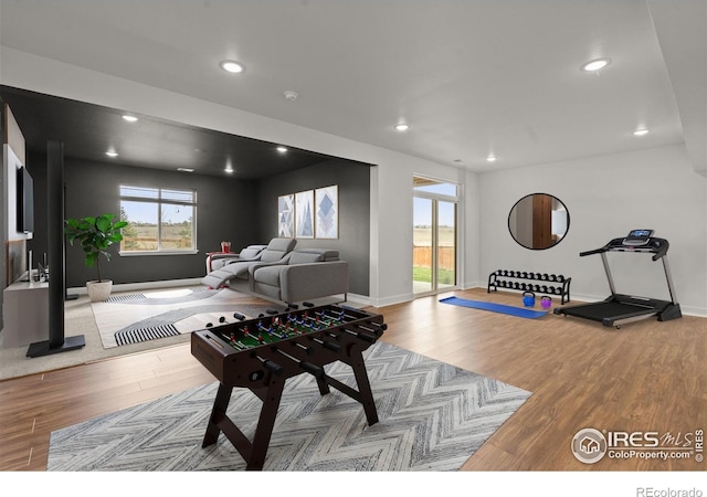1103 Hornet Dr, Fort Collins, CO 80526 - playroom with recessed lighting, baseboards, and wood finished floors