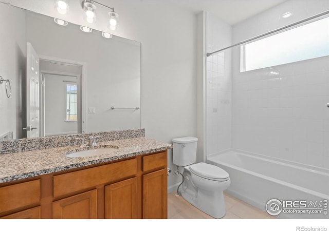 1103 Hornet Dr, Fort Collins, CO 80526 - bathroom with tile patterned floors, vanity, shower / bathing tub combination, and toilet