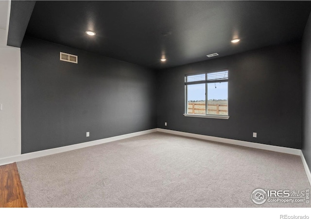 1103 Hornet Dr, Fort Collins, CO 80526 - empty room featuring carpet floors, baseboards, visible vents, and recessed lighting