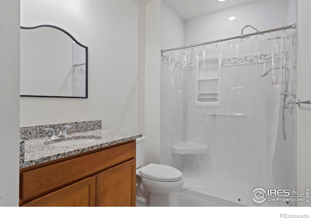 1103 Hornet Dr, Fort Collins, CO 80526 - bathroom with toilet, vanity, and a shower with shower curtain