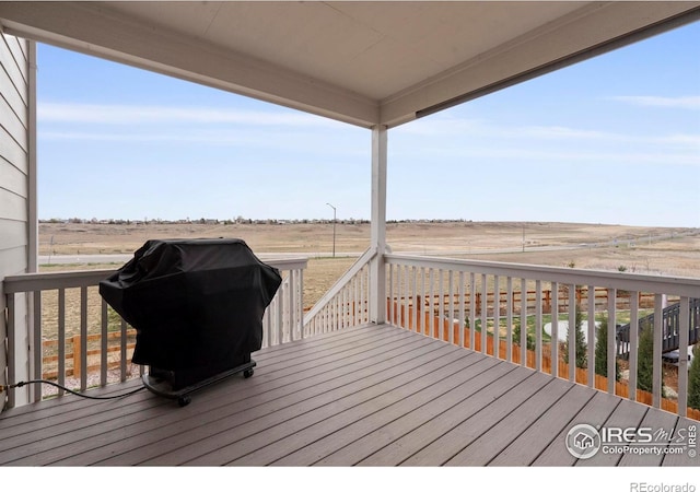 1103 Hornet Dr, Fort Collins, CO 80526 - wooden terrace with area for grilling and a rural view