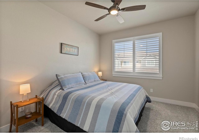 1708 W 50th St, Loveland, CO 80538 - carpeted bedroom with baseboards and a ceiling fan