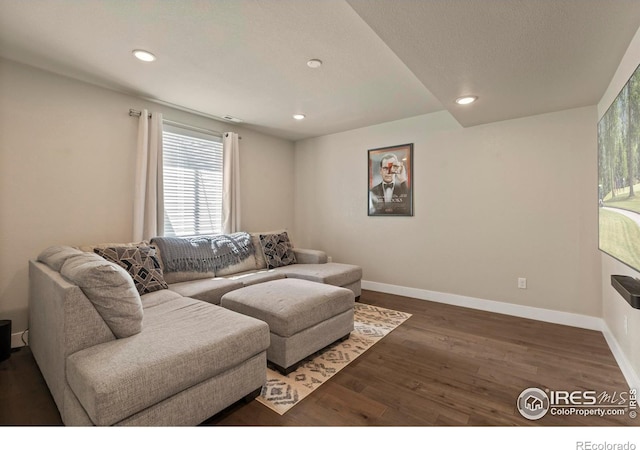 1708 W 50th St, Loveland, CO 80538 - living area with wood finished floors, baseboards, and recessed lighting