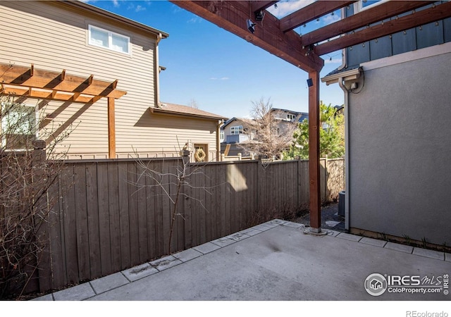 3620 Paonia St, Boulder, CO 80301 - view of patio / terrace with a pergola and fence