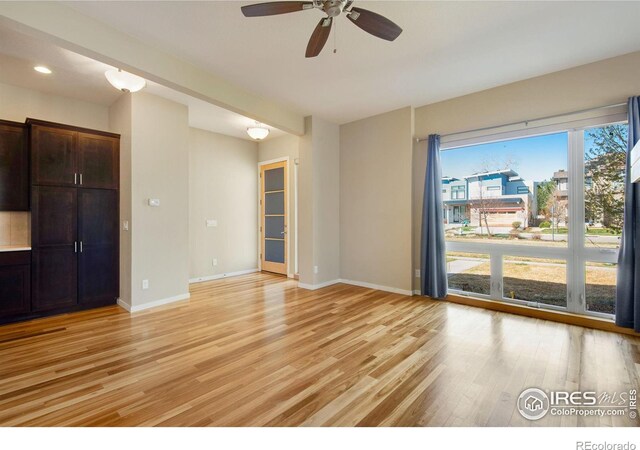 3620 Paonia St, Boulder, CO 80301 - unfurnished room featuring light wood finished floors, baseboards, a ceiling fan, and recessed lighting