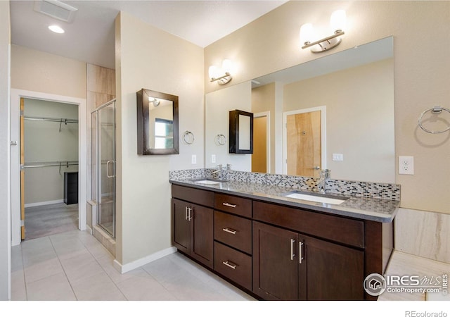 3620 Paonia St, Boulder, CO 80301 - full bathroom with double vanity, a sink, and a stall shower