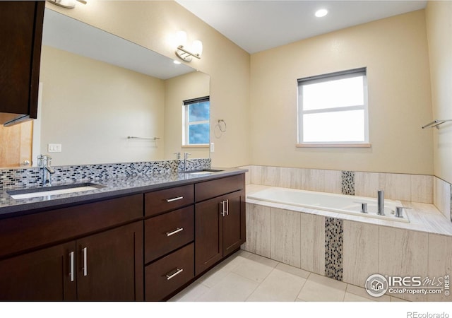 3620 Paonia St, Boulder, CO 80301 - full bath featuring a sink, a bath, double vanity, and tile patterned flooring