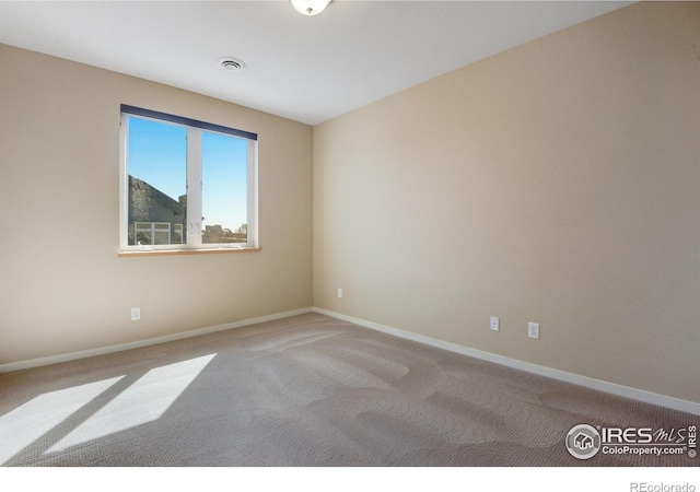 3620 Paonia St, Boulder, CO 80301 - empty room with carpet flooring, visible vents, and baseboards