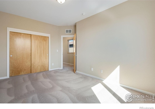 3620 Paonia St, Boulder, CO 80301 - unfurnished bedroom featuring visible vents, a closet, baseboards, and carpet floors