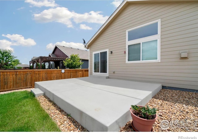view of patio / terrace featuring a gazebo and fence