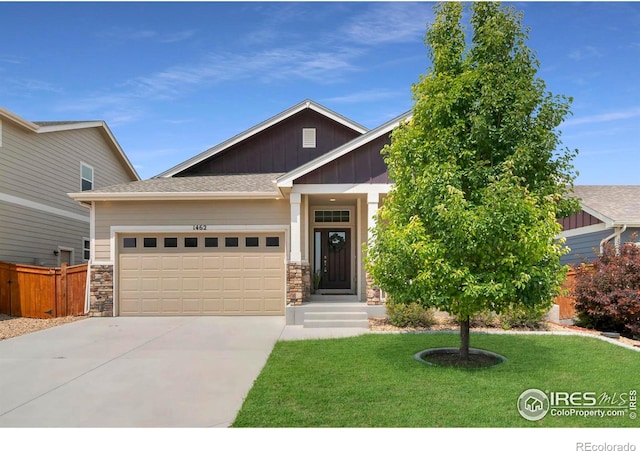 1462 Moraine Valley Dr, Severance, CO 80550 - craftsman inspired home with an attached garage, board and batten siding, driveway, and stone siding