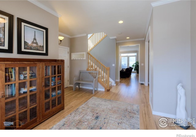 4921 Fountain St, Boulder, CO 80304 - foyer entrance with stairs, wood finished floors, ornamental molding, baseboards, and recessed lighting