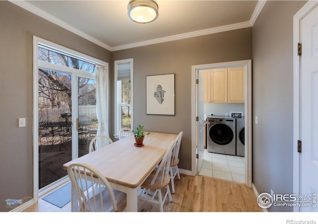 4921 Fountain St, Boulder, CO 80304 - dining area with crown molding, independent washer and dryer, light wood-style flooring, and baseboards