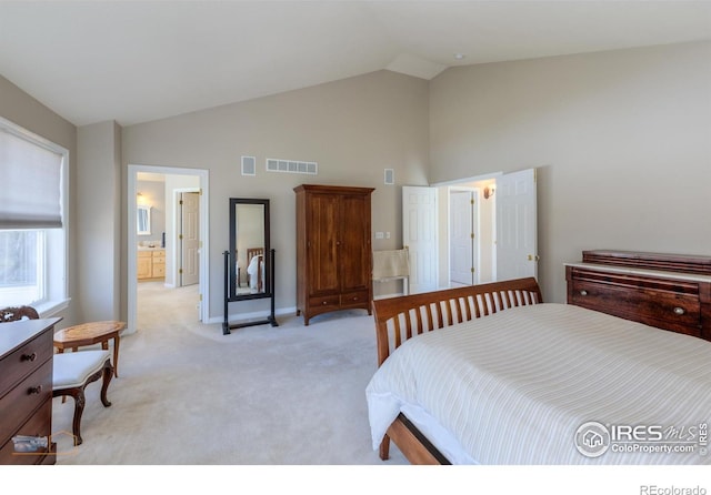 4921 Fountain St, Boulder, CO 80304 - bedroom featuring light carpet, high vaulted ceiling, and baseboards