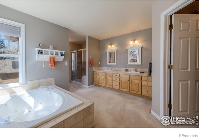 4921 Fountain St, Boulder, CO 80304 - bathroom featuring a stall shower, double vanity, and a jetted tub