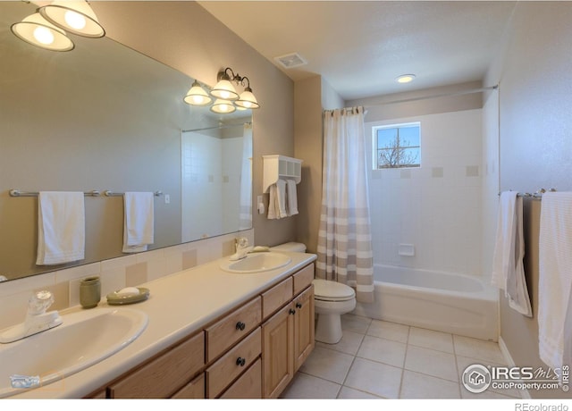 4921 Fountain St, Boulder, CO 80304 - full bathroom featuring toilet, tile patterned flooring, double vanity, and shower / tub combo