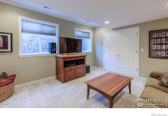 4921 Fountain St, Boulder, CO 80304 - living room with light colored carpet, baseboards, crown molding, and recessed lighting