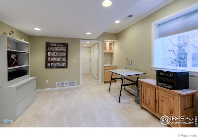 4921 Fountain St, Boulder, CO 80304 - game room with light carpet, recessed lighting, baseboards, a sink, and crown molding