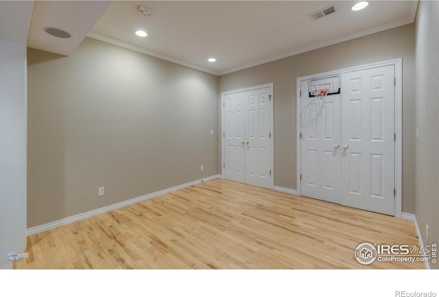 4921 Fountain St, Boulder, CO 80304 - foyer featuring wood finished floors, crown molding, baseboards, and recessed lighting