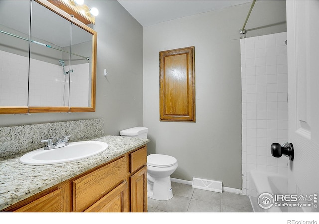 3735 W 8th St, Greeley, CO 80634 - full bath with shower / bathtub combination, vanity, visible vents, toilet, and tile patterned floors