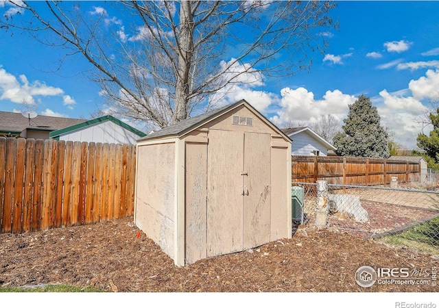 3735 W 8th St, Greeley, CO 80634 - view of shed with a fenced backyard