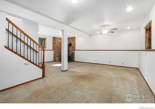 13236 Otter Rd, Loveland, CO 80538 - below grade area featuring a ceiling fan, carpet flooring, stairway, recessed lighting, and baseboards