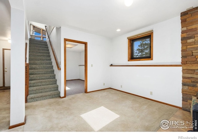 13236 Otter Rd, Loveland, CO 80538 - finished below grade area with carpet flooring, stairs, and baseboards