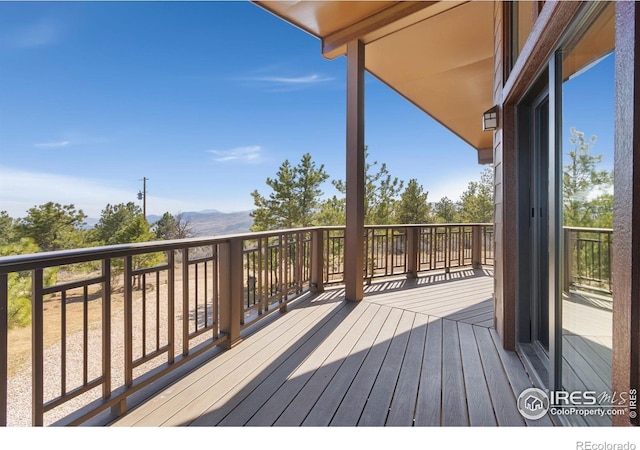 13236 Otter Rd, Loveland, CO 80538 - wooden terrace with a mountain view