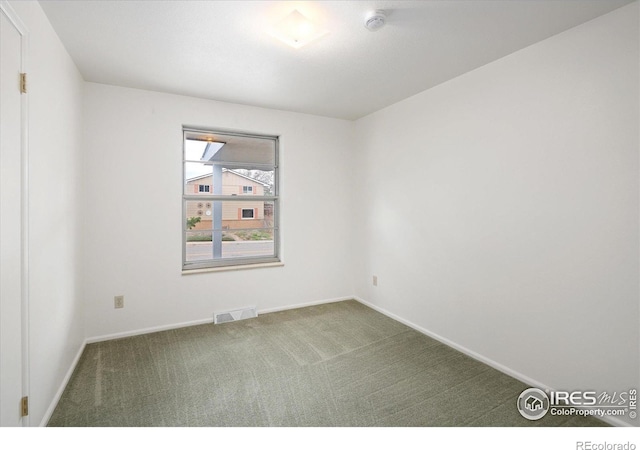 2610 Heidelberg Dr, Boulder, CO 80305 - unfurnished room featuring carpet, visible vents, and baseboards