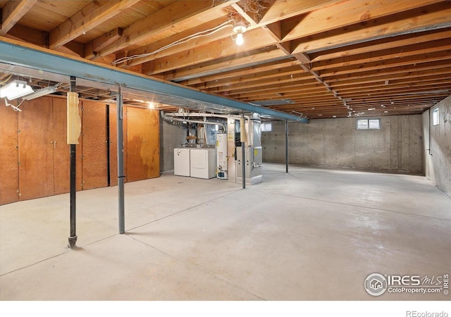 2610 Heidelberg Dr, Boulder, CO 80305 - unfinished below grade area with washer and dryer and gas water heater