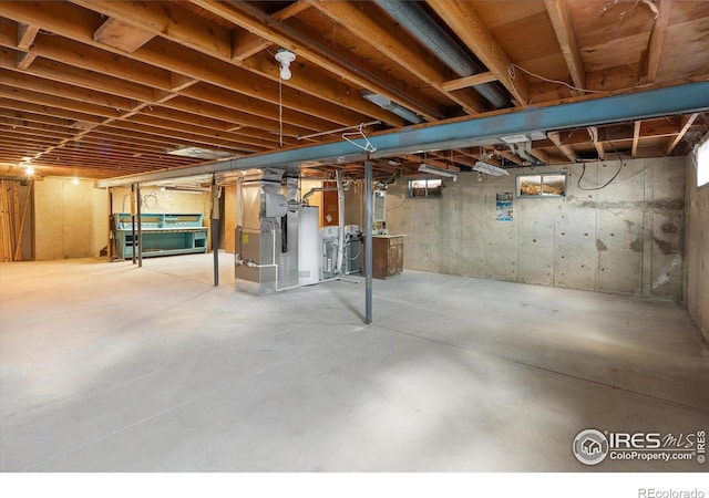 2610 Heidelberg Dr, Boulder, CO 80305 - unfinished below grade area featuring water heater