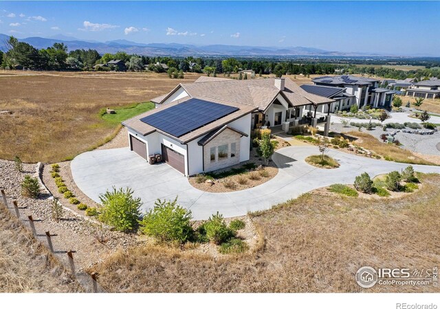 bird's eye view with a mountain view