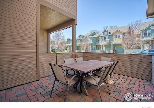 835 Kane Dr Unit 25, Longmont, CO 80501 - view of patio / terrace featuring a residential view and outdoor dining area