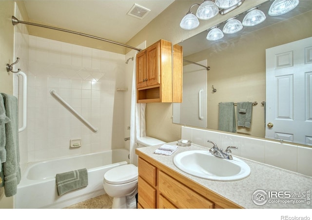 835 Kane Dr Unit 25, Longmont, CO 80501 - bathroom featuring vanity, visible vents, bathtub / shower combination, and toilet