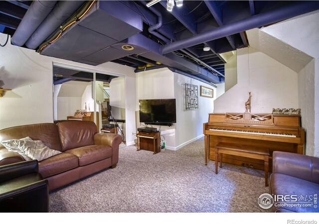 835 Kane Dr Unit 25, Longmont, CO 80501 - living room featuring carpet flooring and baseboards
