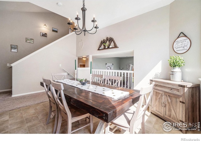 2118 74th Avenue Ct, Greeley, CO 80634 - dining space featuring a notable chandelier and baseboards